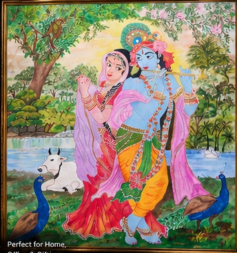 Hand-painted Radha Krishna artwork in a gold frame